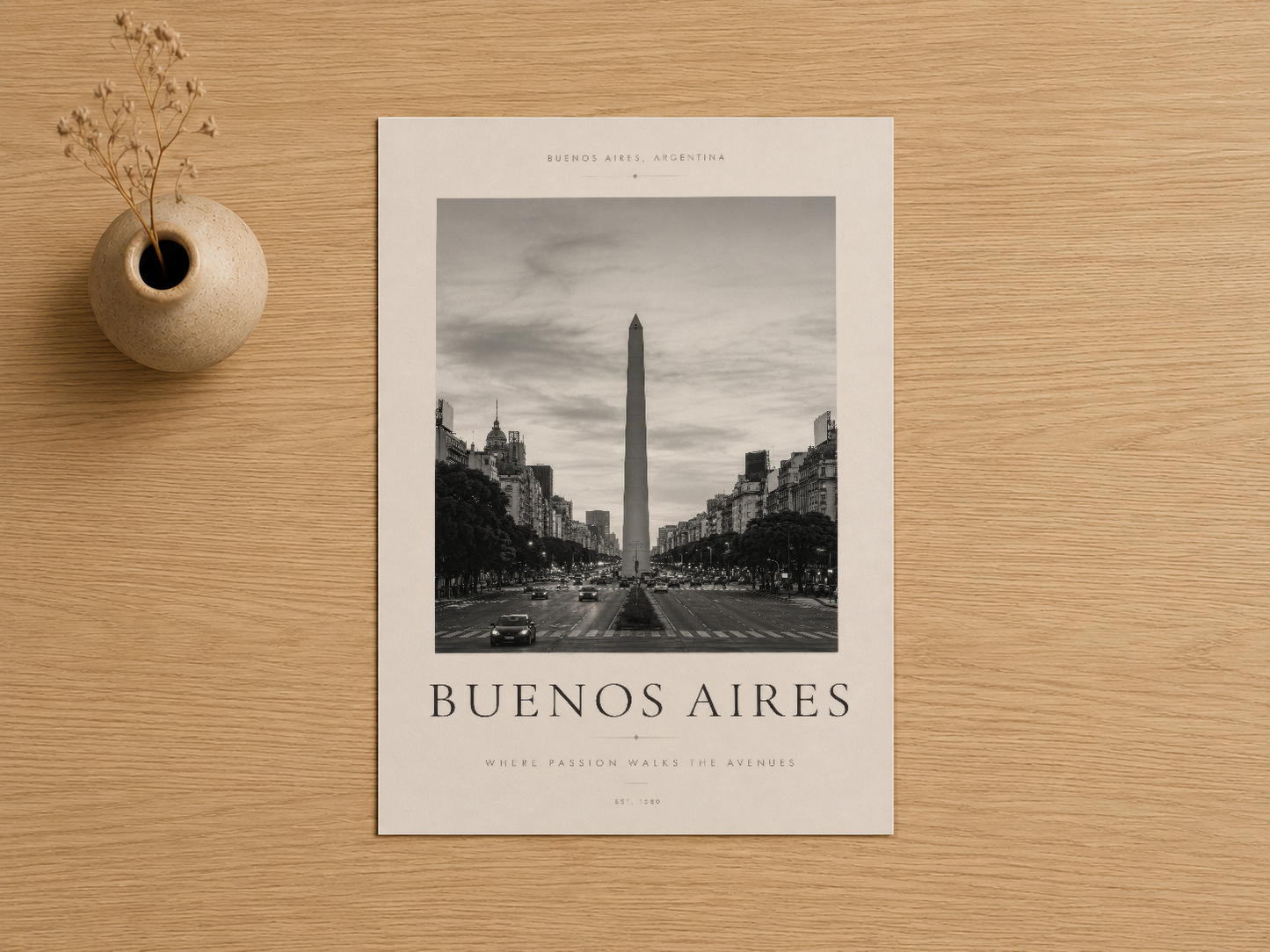 Buenos Aires şehir manzarası ve Obeli'nin simetrik fotoğrafını sunan minimalist tasarımı ve tipografik detayları.