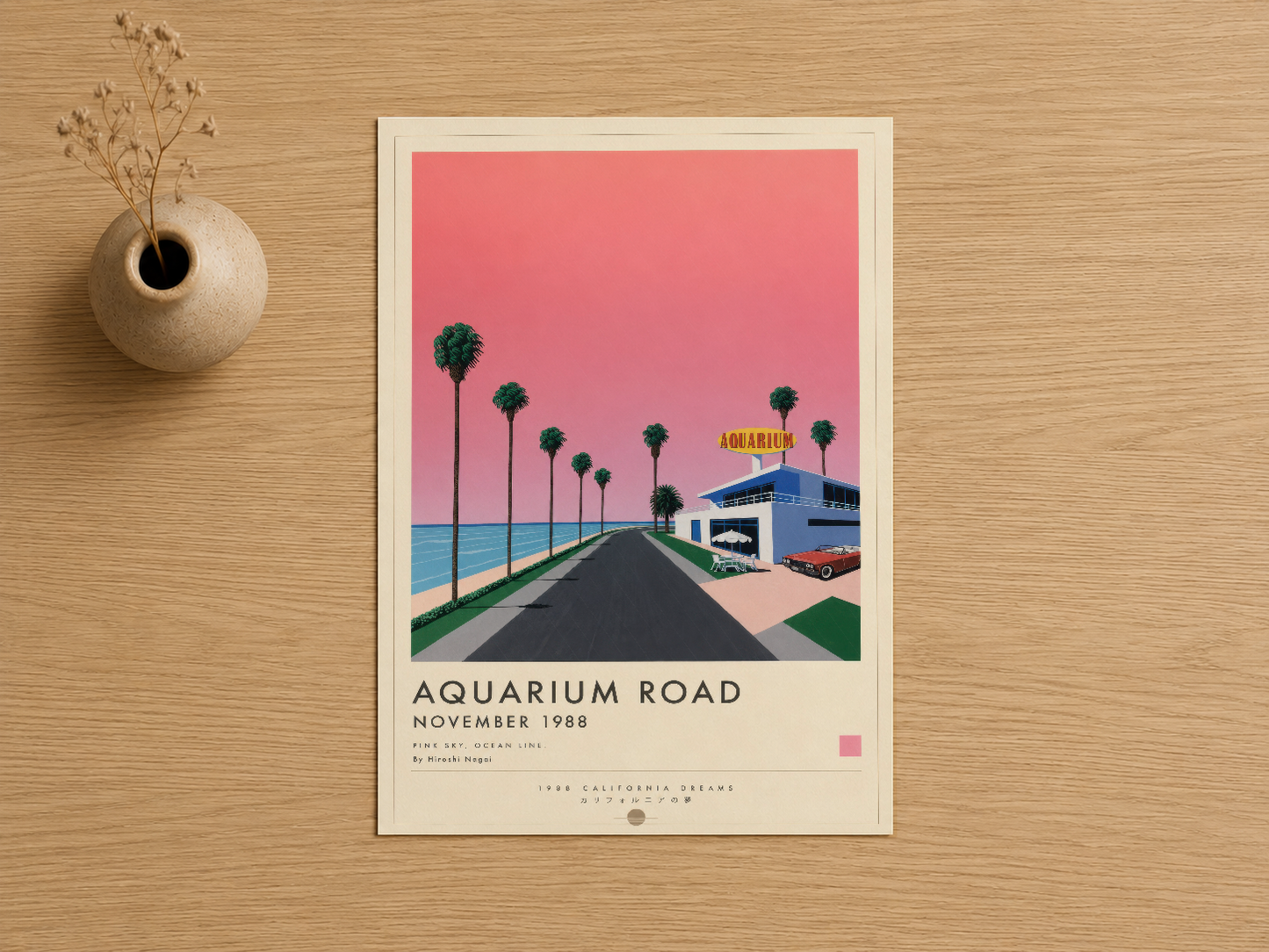 Aquarium Road 1988 baskısı, pembe ufuklu retro California yolu sahnesi, geometrik tasarımda vintage poster.