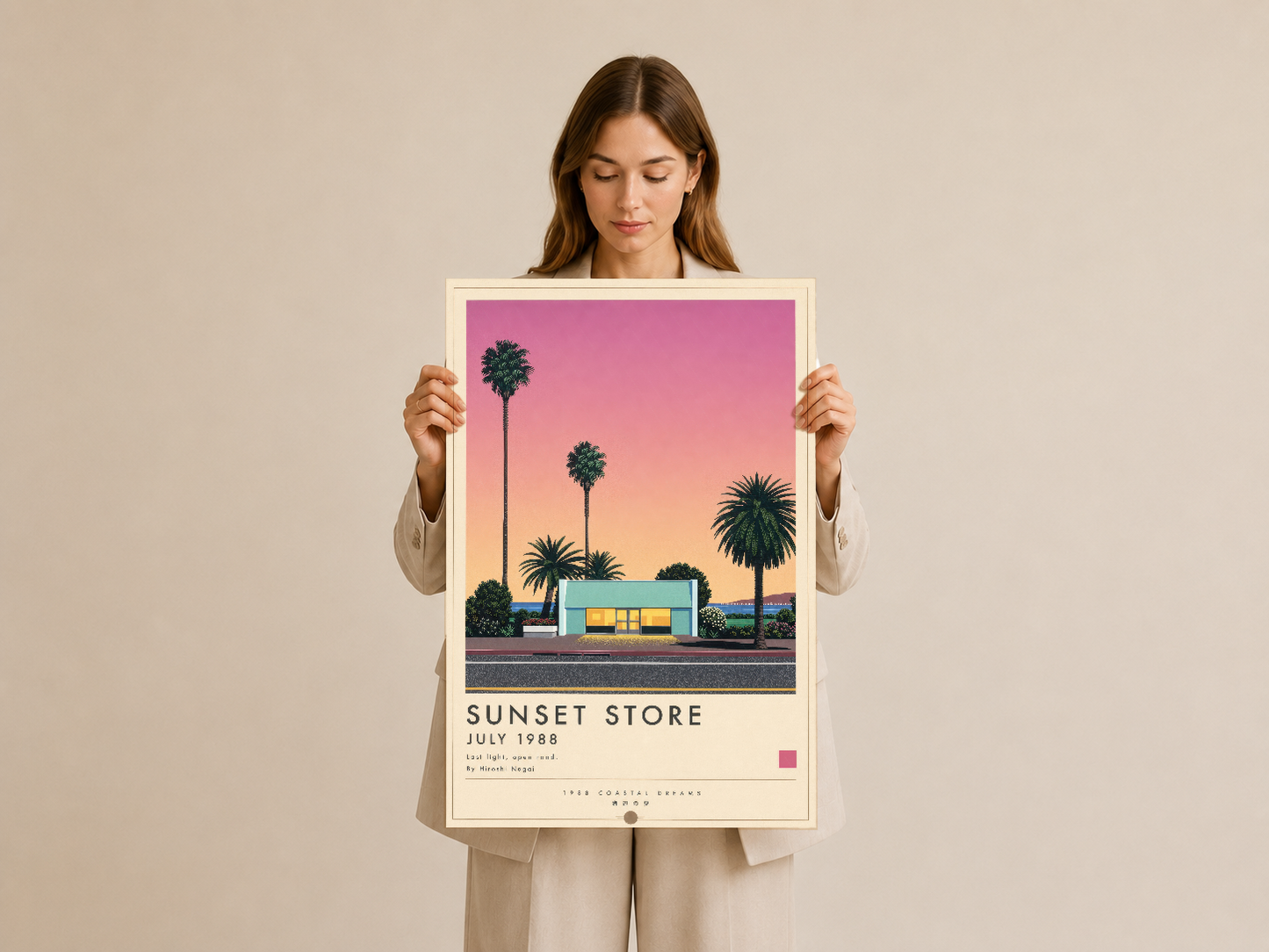 Sunset Store retro poster, krem çerçevesiyle elde tutuluyor, pastel renkli gökyüzü ve ikonik mağaza mimarisi.