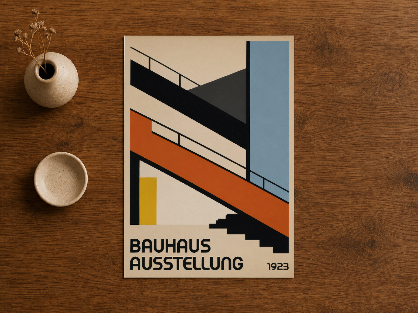 Bauhaus Ausstellung 1923 tablosu, soyut geometrik tasarım, ahşap masa üzerinde sergilendi.