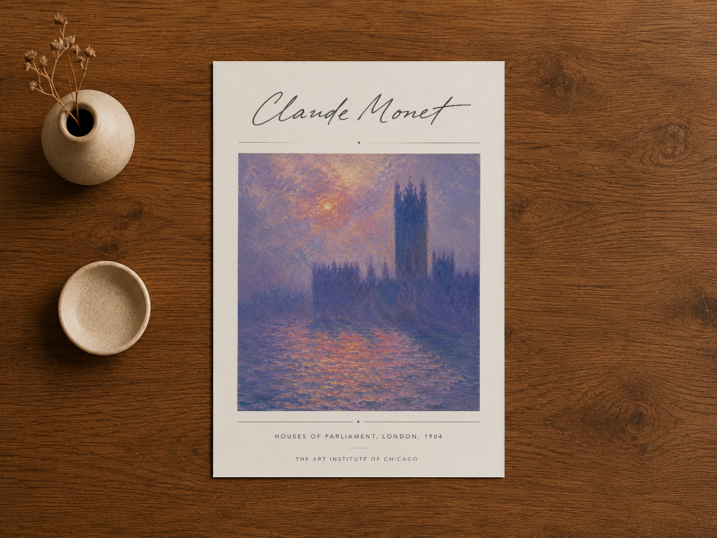 Claude Monet imzalı Houses of Parliament baskısı, ahşap zeminde ve doğal dekorasyon öğeleriyle sergileniyor.