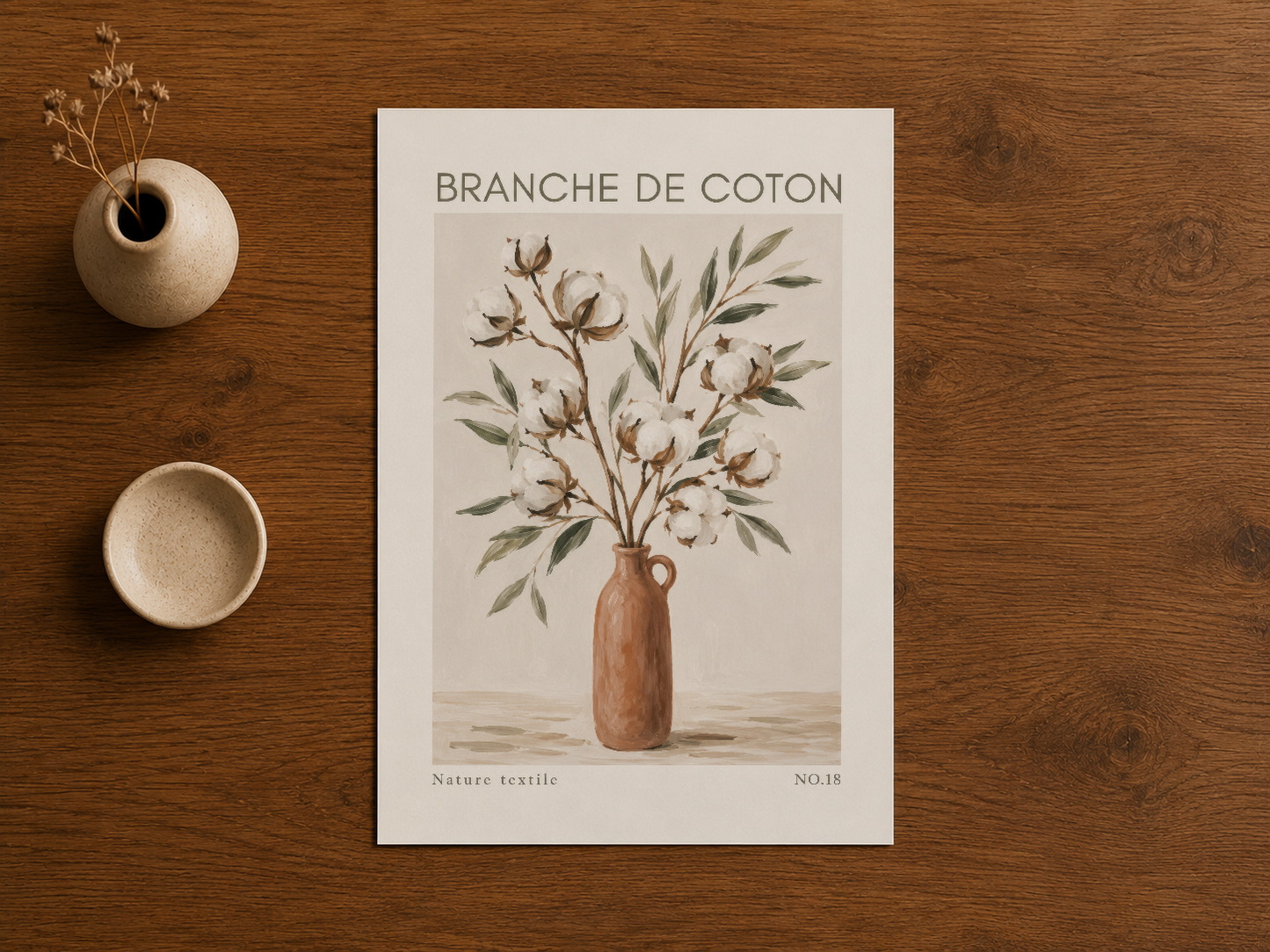 Masanın üstüne yerleştirilen, naturel tonlarla resmedilmiş pamuk ağacı motiflı poster.