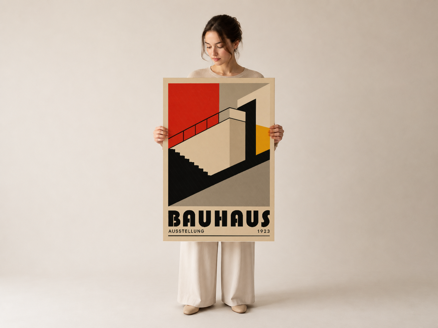 Bauhaus 1923 tablosu, kişinin elinde görülen orijinal sanat baskısı, zamansal tasarımın başyapıtı.