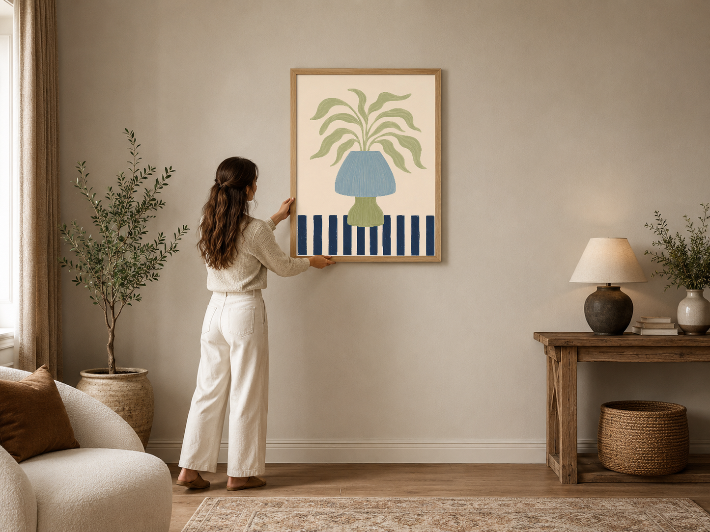Sade tasarımlı saksıda yeşil bitki ve çizgili desen içeren minimalist sanat tablosu, ahşap çerçevede.