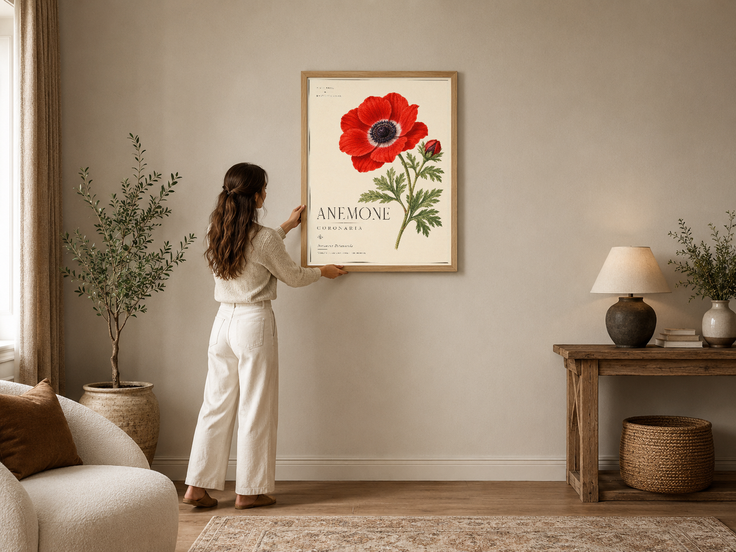 Kırmızı anemon çiçeğinin botanik illüstrasyonu, çerçeveli poster, modern salon dekorasyonunda sergilenmekte.