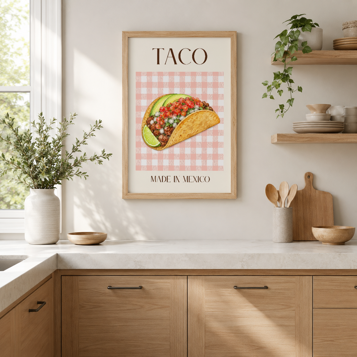 Mutfak duvarında ahşap çerçeveli, pembe kareli zemine renkli doldurmalı taco görseli ve Made in Mexico yazısı.