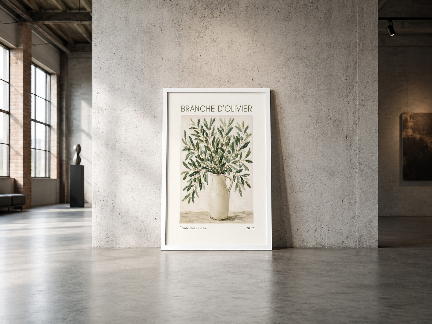 Beyaz çerçeveli zeytin dalı posteri, endüstriyel loft alanında modern ve minimalist tarz yansıtıyor.