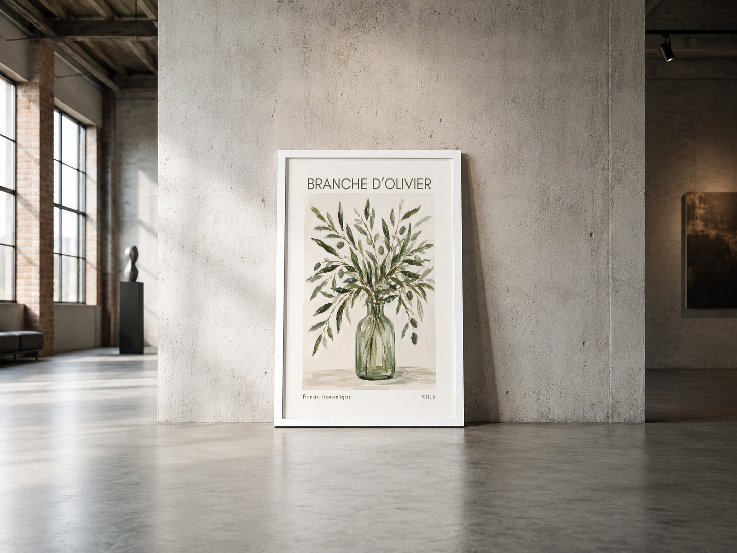 Beyaz çerçeveli botanik zeytin dalı posteri, endüstriyel betonlu mekandaki minimalist dekorasyonda.
