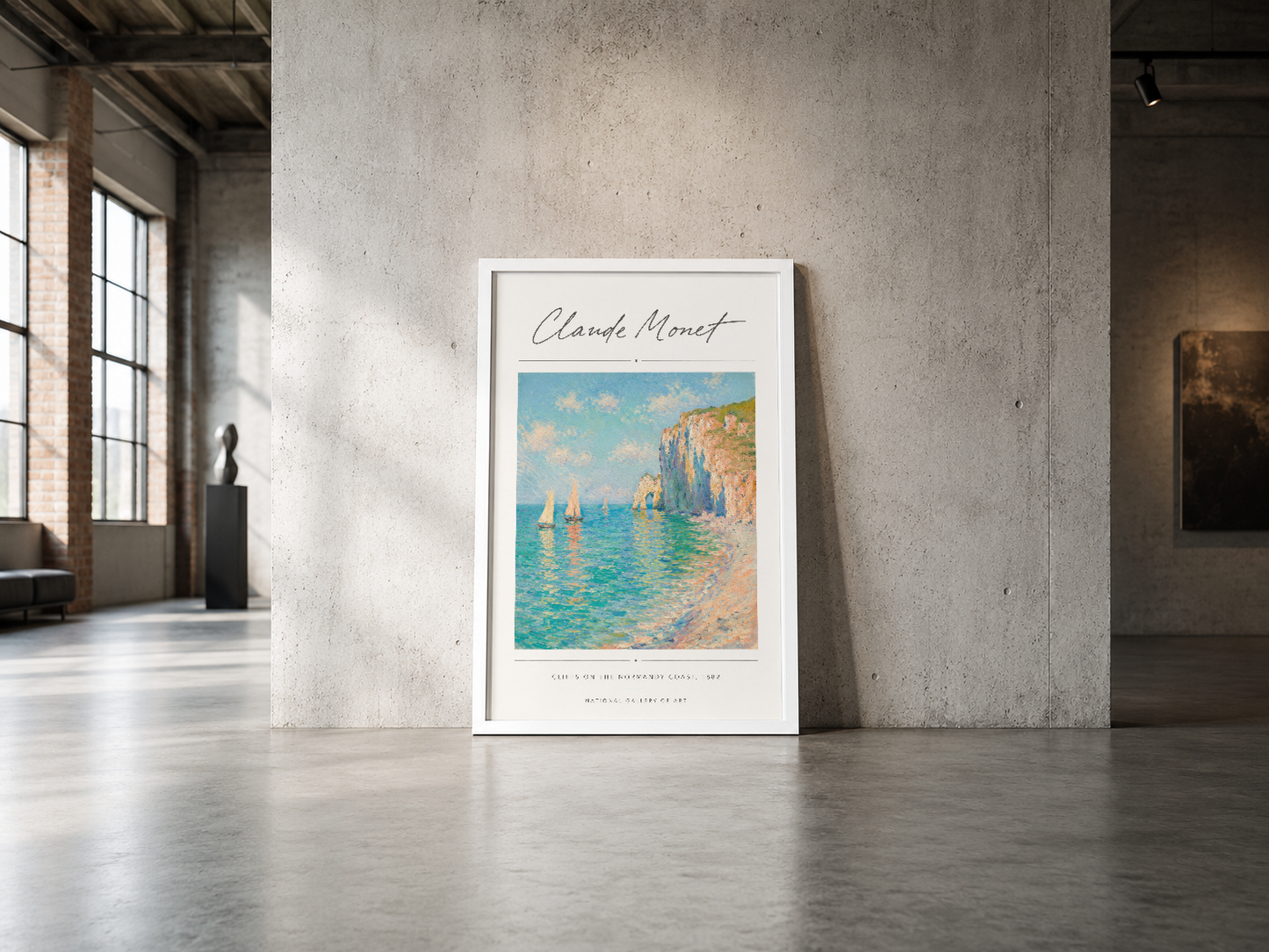 Monet imzalı deniz manzarası posteri, beyaz çerçevede endüstriyel minimalist mekanda.
