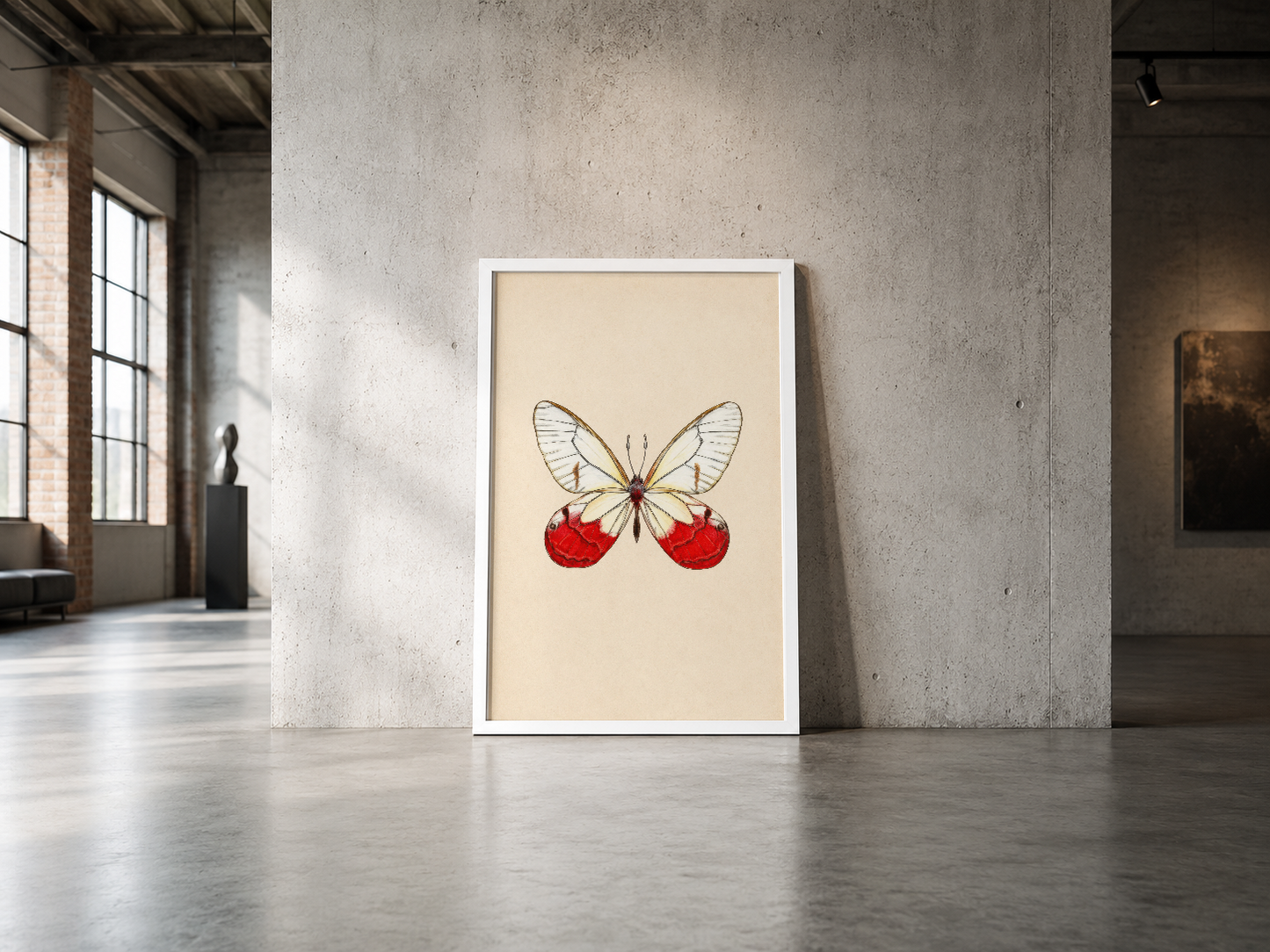 Minimalist beyaz çerçeveli kelebek poster, kırmızı elma motifiyle endüstriyel mekan duvarında modern estetik.