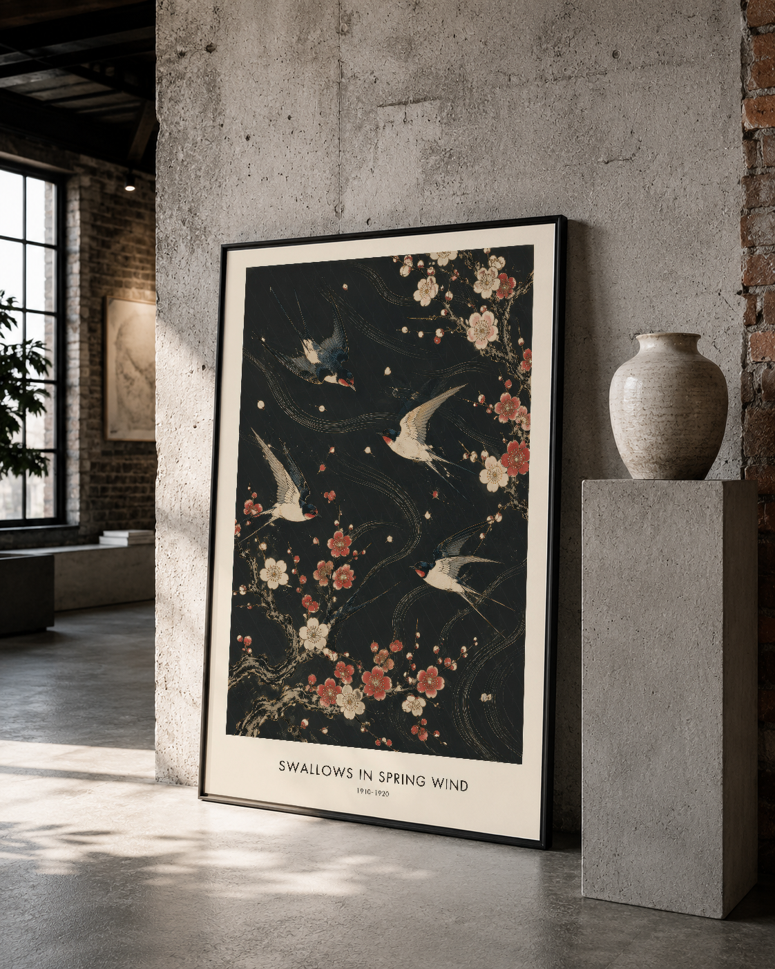 Modern endüstriyel alanda, siyah çerçeveli kuş ve çiçek desenli duvar posteri.