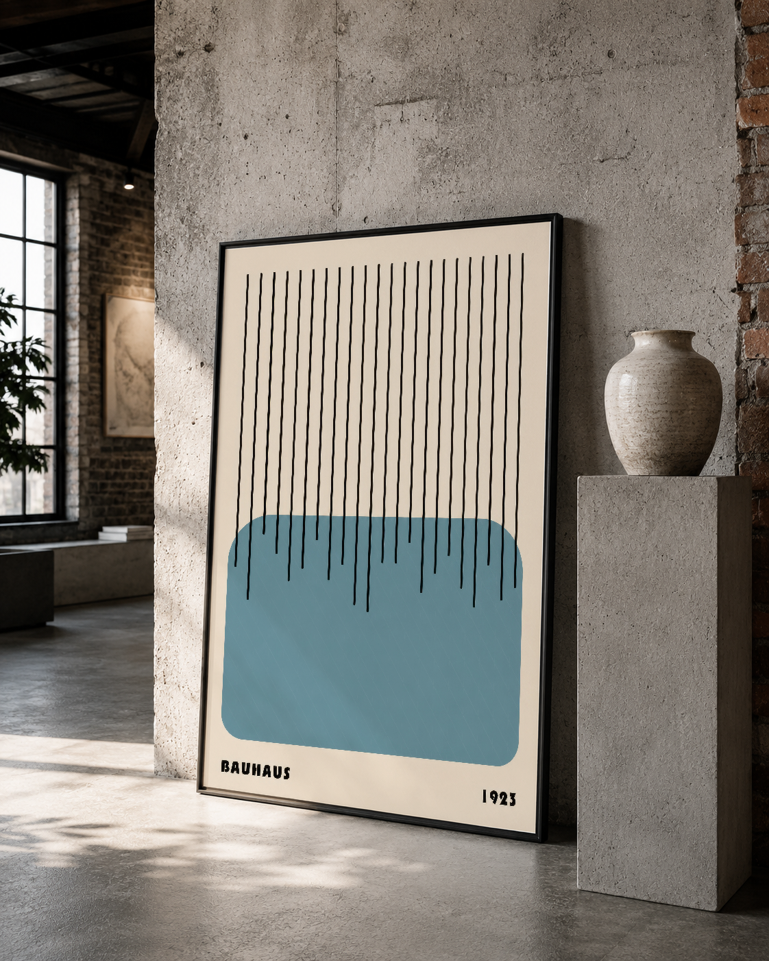 Çizgi ve renk oyunu yapan Bauhaus poster, bare betonlu mekanı sanatsal bir dokunuşla zenginleştiriyor.