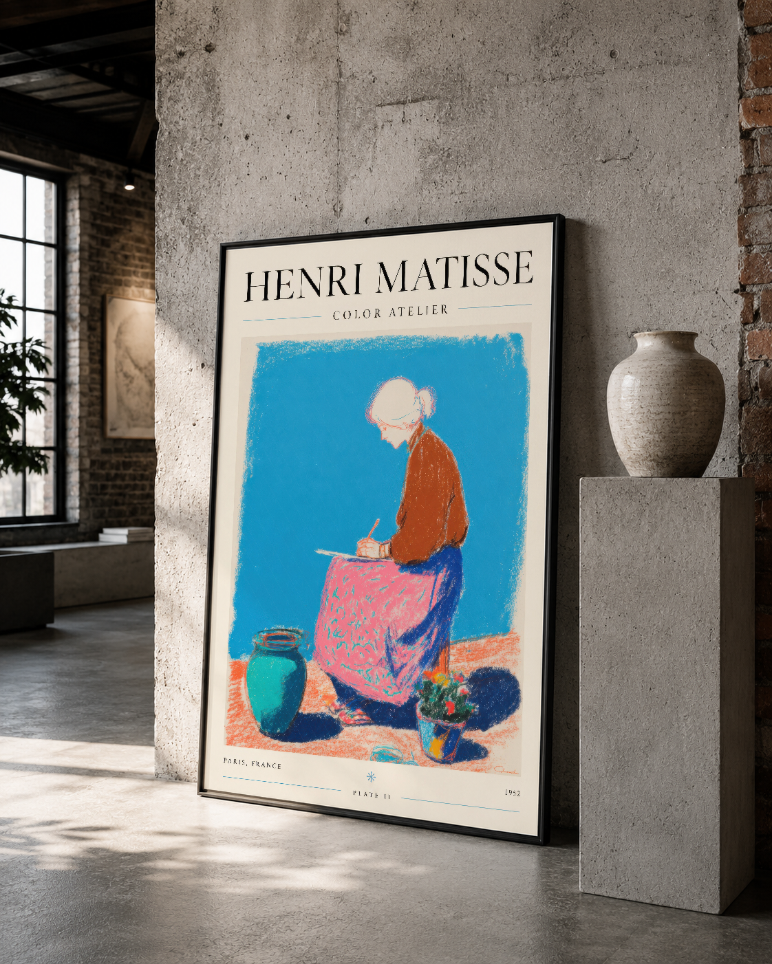 Color Atelier serisinden siyah çerçeveli Matisse posteri, beton duvar dekorasyonunun merkezinde sanat objesinin yanında.