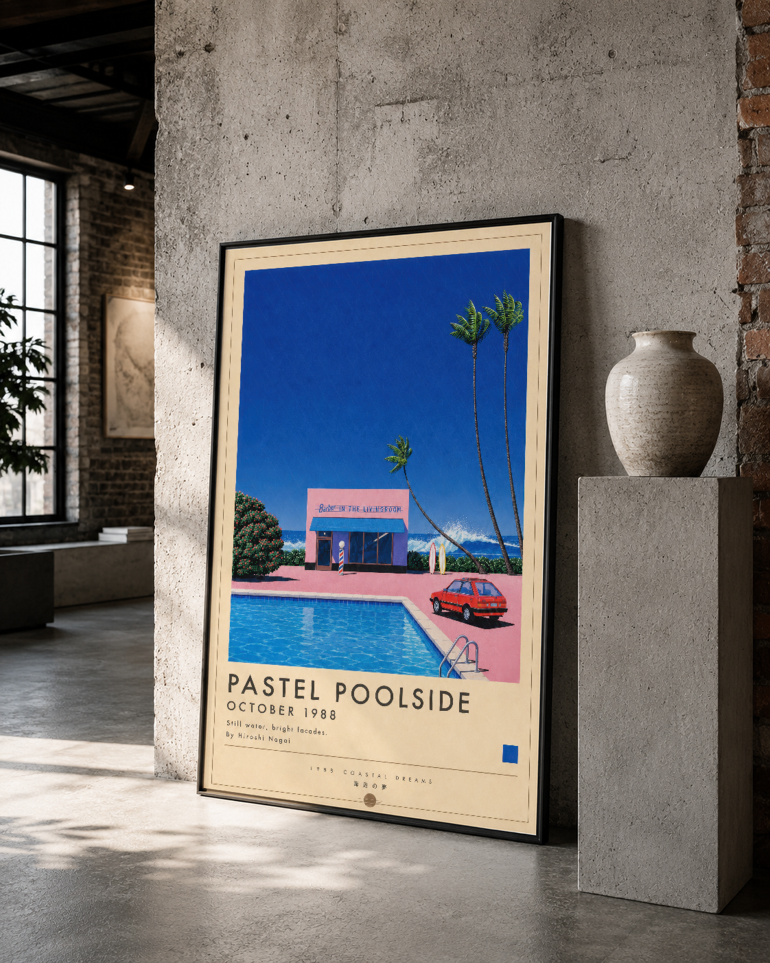 Renkli ve minimalist tasarımlı Pastel Poolside tablosu, siyah çerçevede, brüt betonun karşısında kontrast yaratıyor.