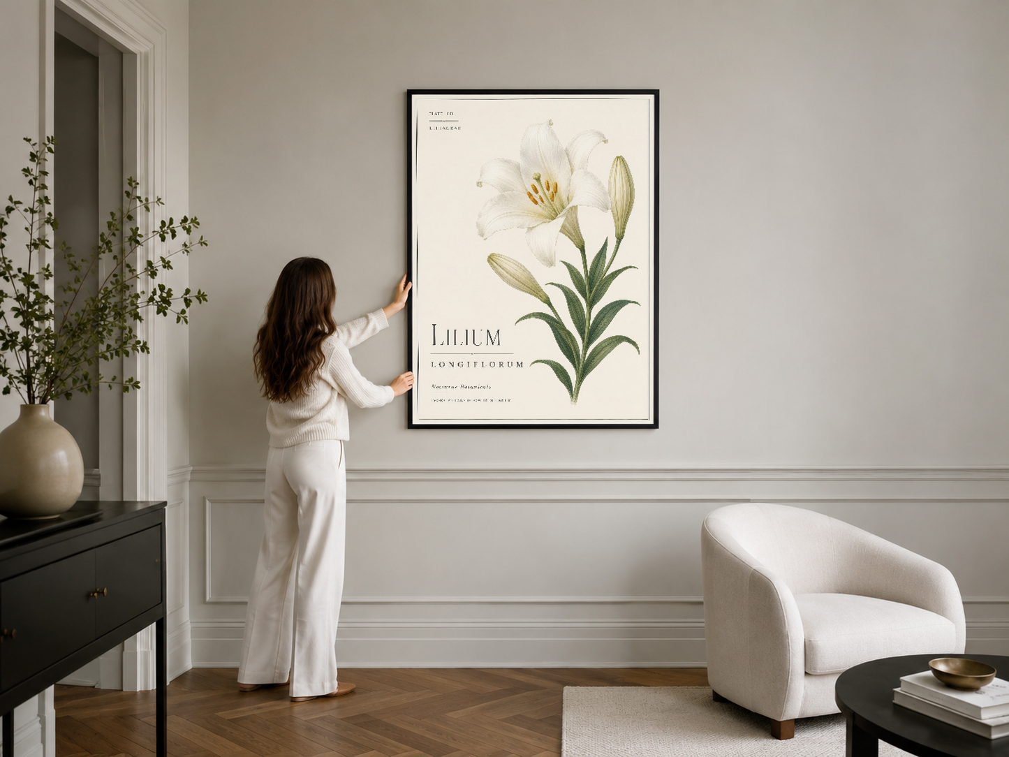 Siyah çerçeveli lilium longiflorum tablosu, şık iç mekanı döşem ve botanik öğesiyle tamamlıyor.