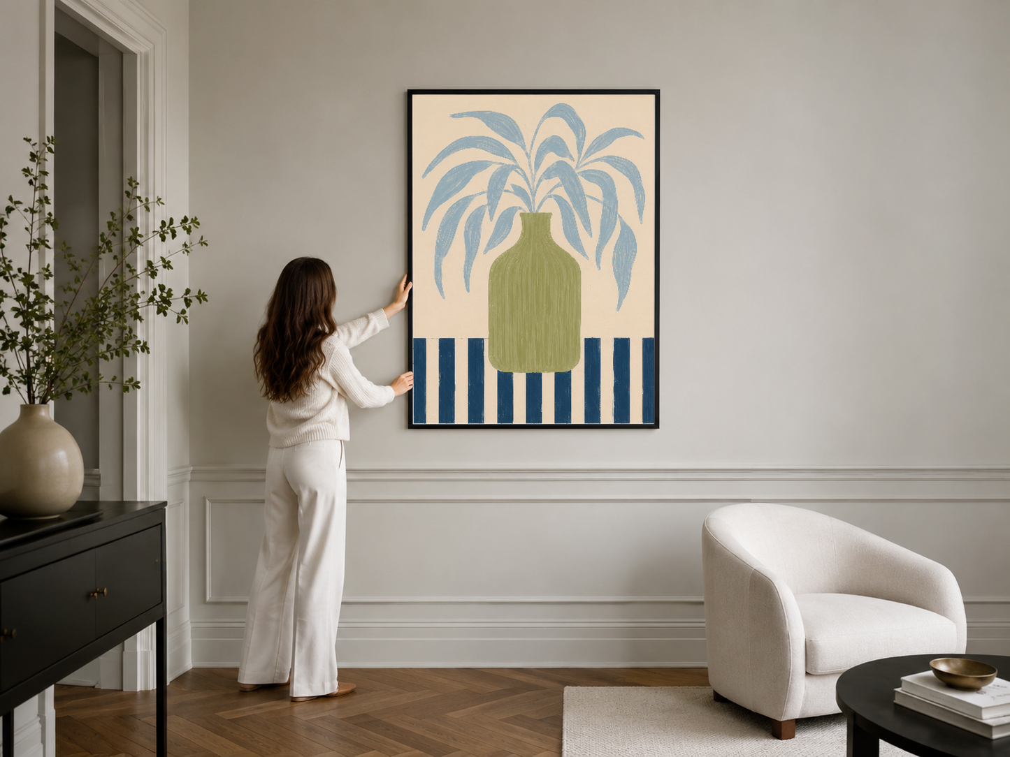 Kontrastlı siyah çerçeveli, sanat dekoratif bitkili tablosu modern yaşam alanlarında.