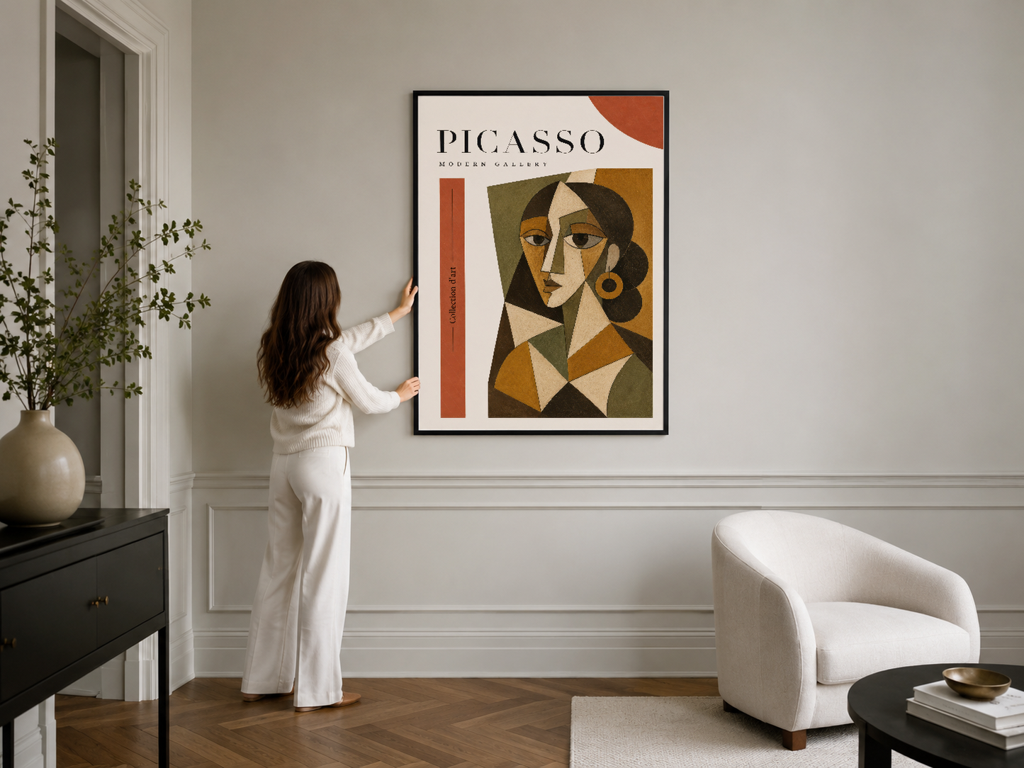 Siyah çerçeveli Picasso portre eseri, sıcak renkli geometrik tasarım, klasik iç mekân dekorasyonunda.