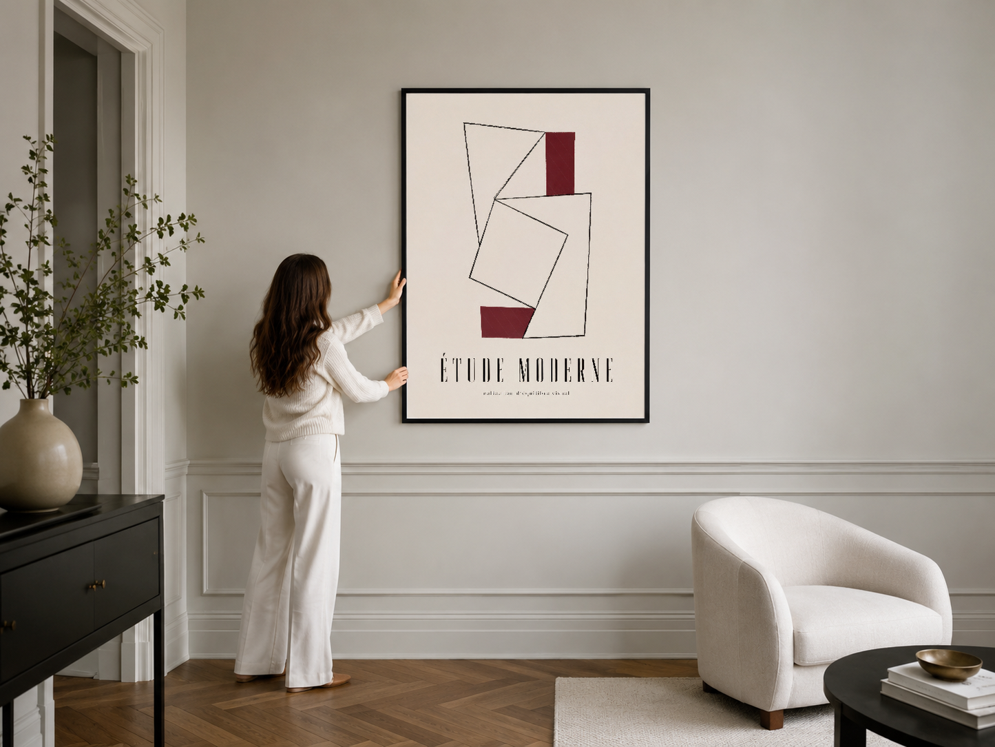 Minimalist geometrik sanat tablosu siyah çerçevede, şık iç mekanda modern duvar sanat uygulaması.