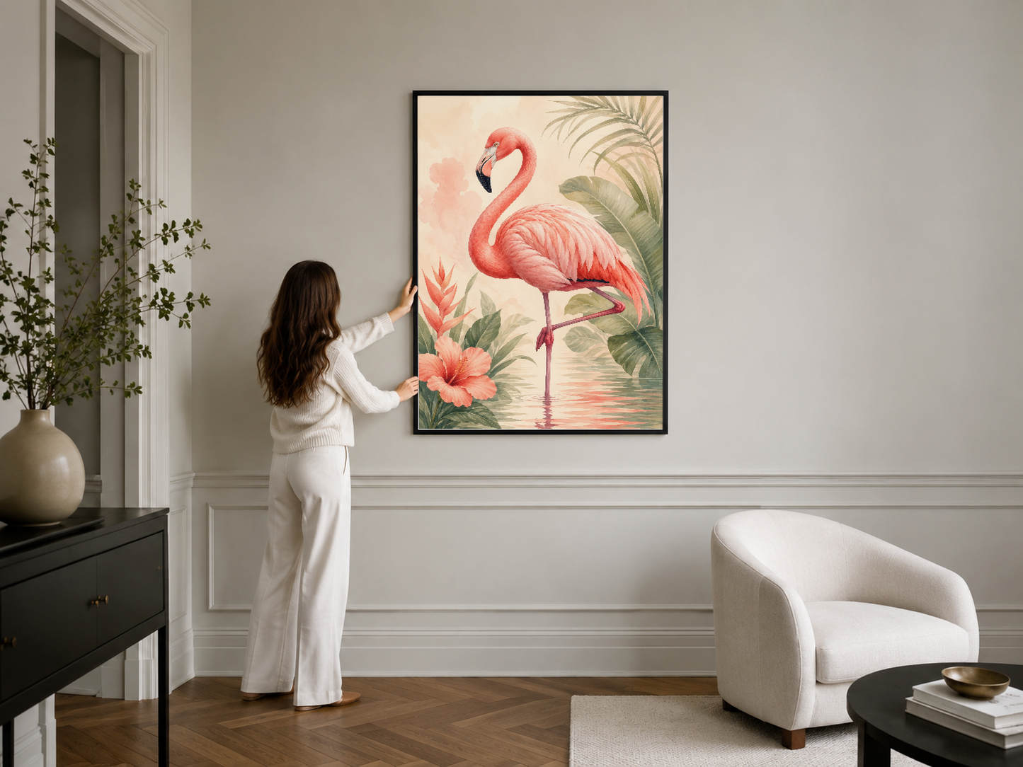 Suluboya flamingo tablosu, siyah çerçevelenmiş, şıklığı andıran oturma alanında sergilenmiş.