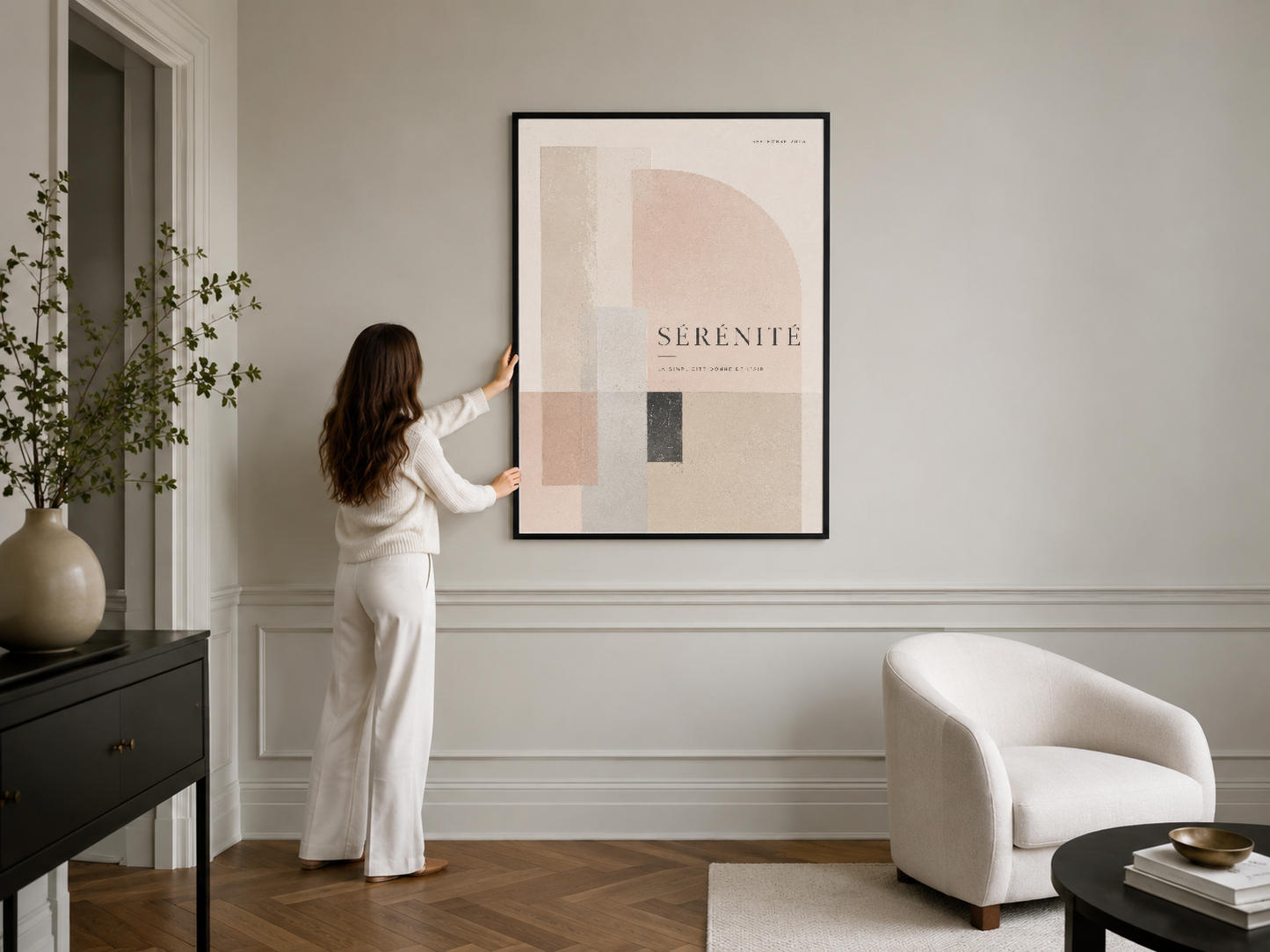 Siyah çerçeveli minimalist tablo, nötr duvarında ışık ve gölgeyle güzellik yaratan dekoratif bir başyapıt.