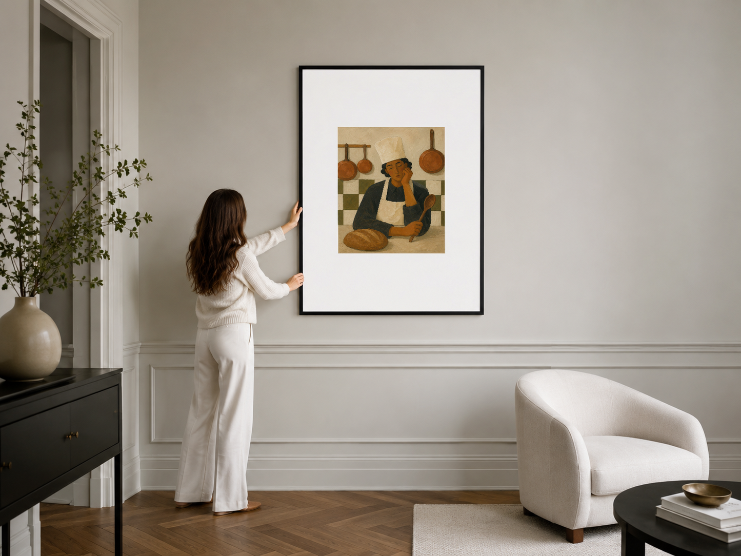 Minimalist iç mekanda siyah çerçeveli, mutfak temalı vintage sanat tablosu.
