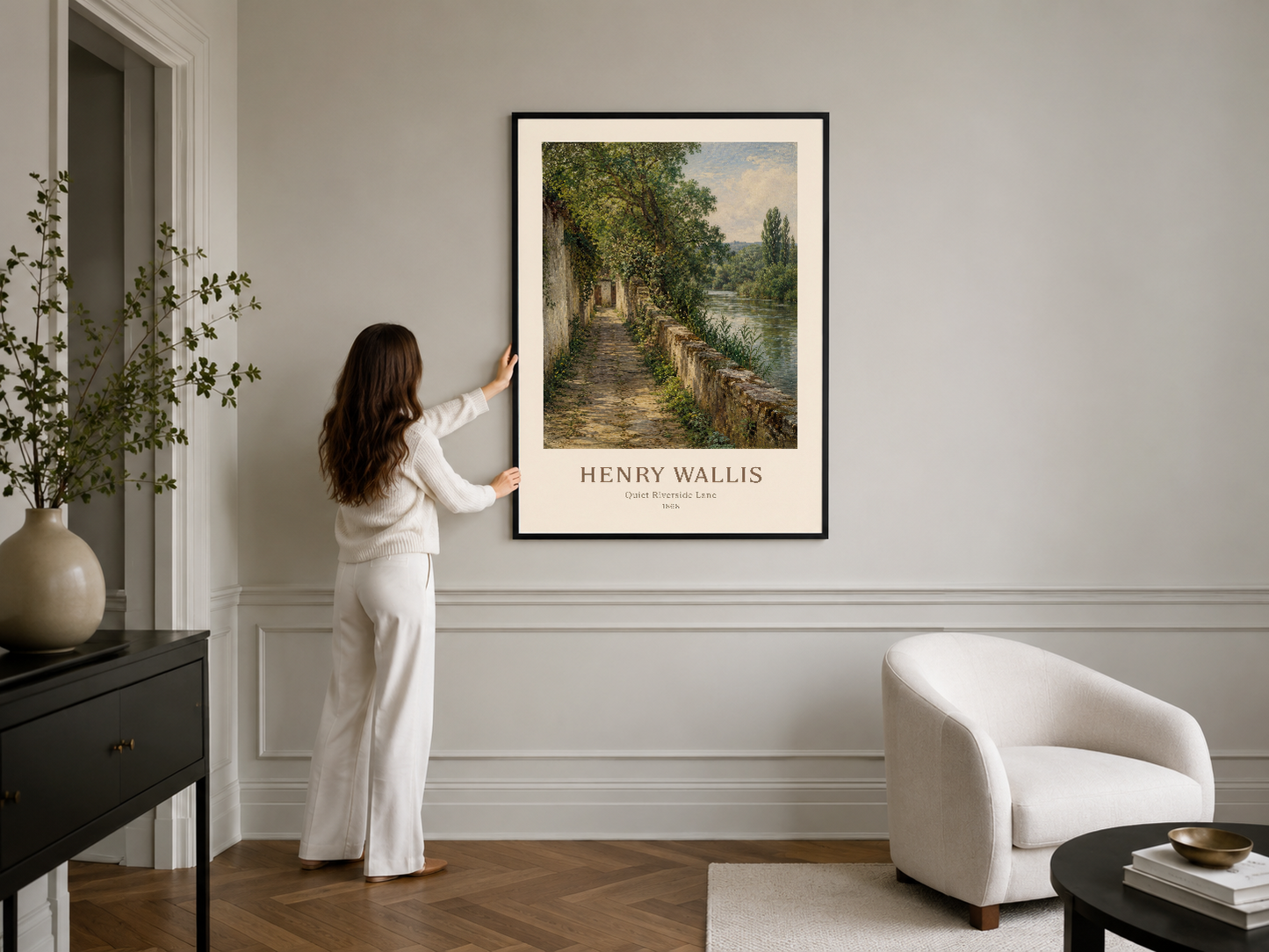 Şık siyah çerçeveli Henry Wallis posteri, modern oturma odasının duvarında rahatlık hissi veriyor.