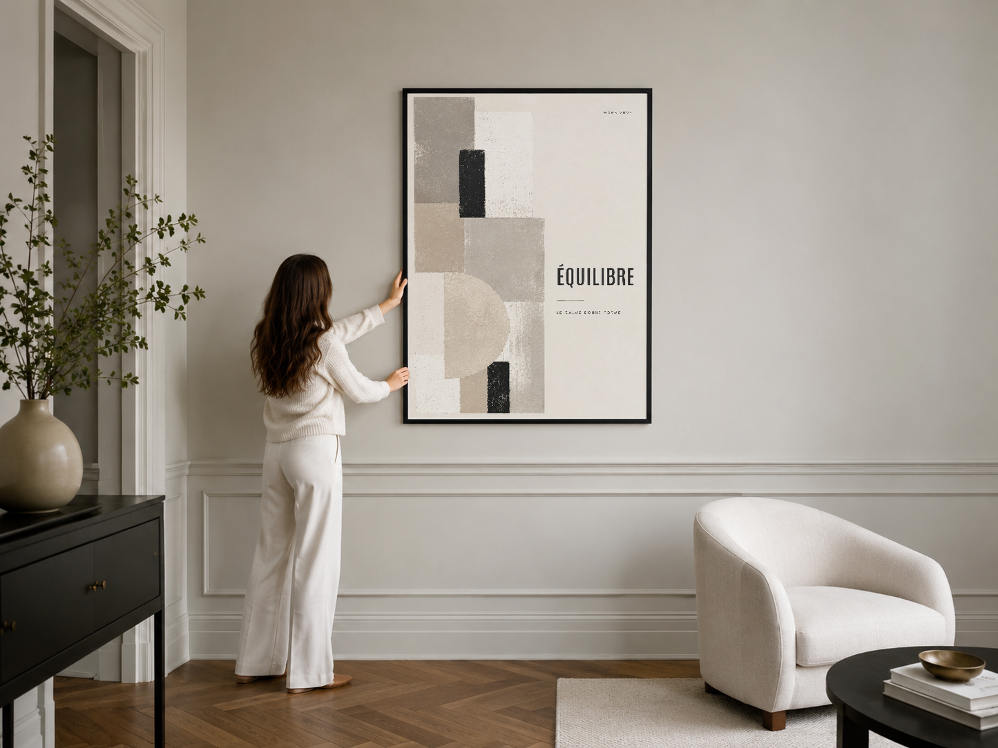 Equilibre posteri siyah çerçeveli, yumuşak geometrik formlar ve tipografi ile rafine oda dekorasyonunun merkezi.