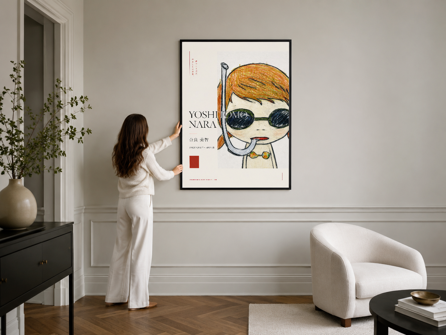 Modern iç mekanda siyah çerçeveli sanat tablosu, minimalist gözlüklü karakter tasarımı.