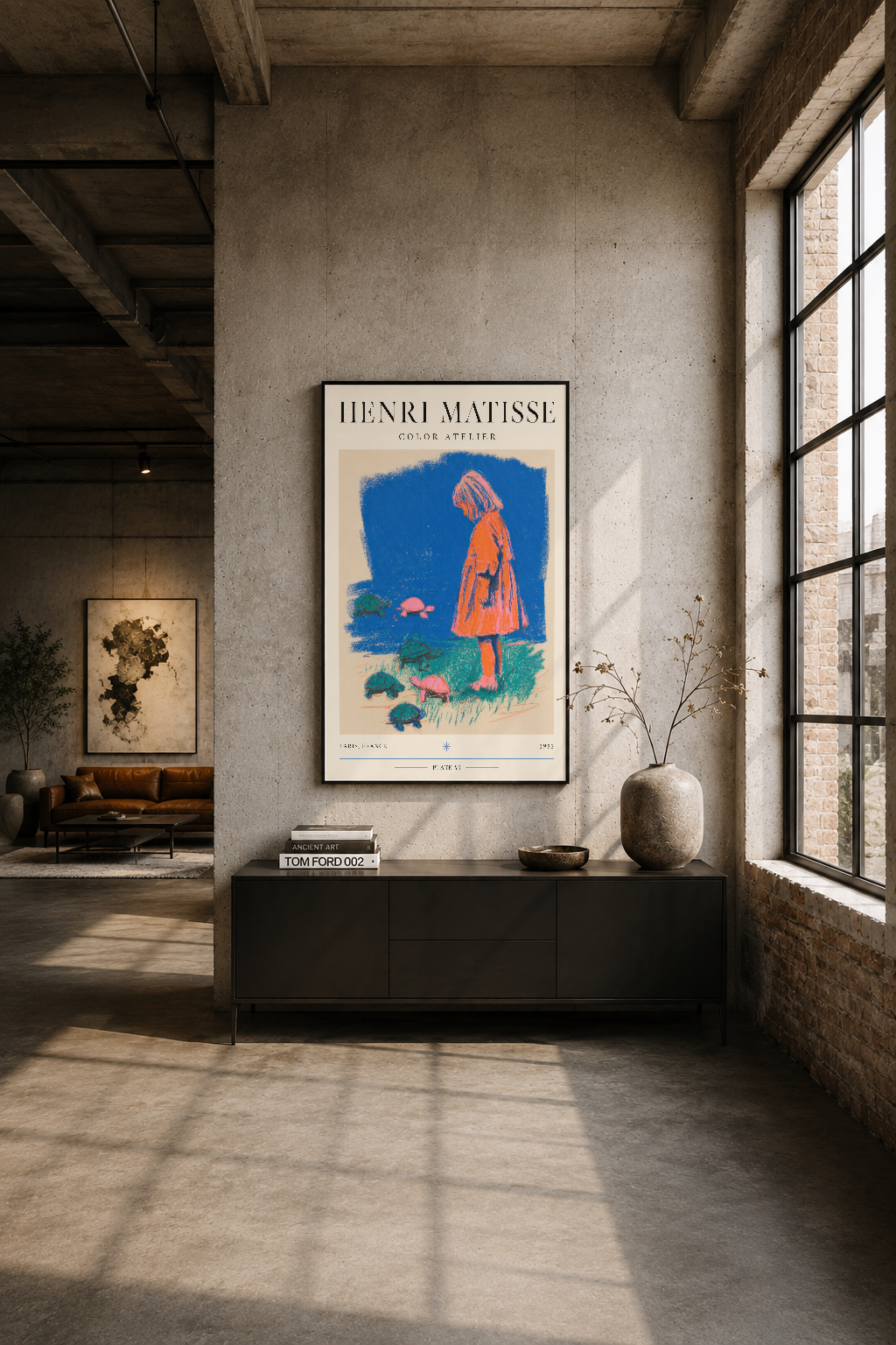Endüstriyel loft tasarımında, beton duvarının üzerinde siyah çerçeveli Matisse tablosu sanat ve mekan uyumunu yansıtıyor.