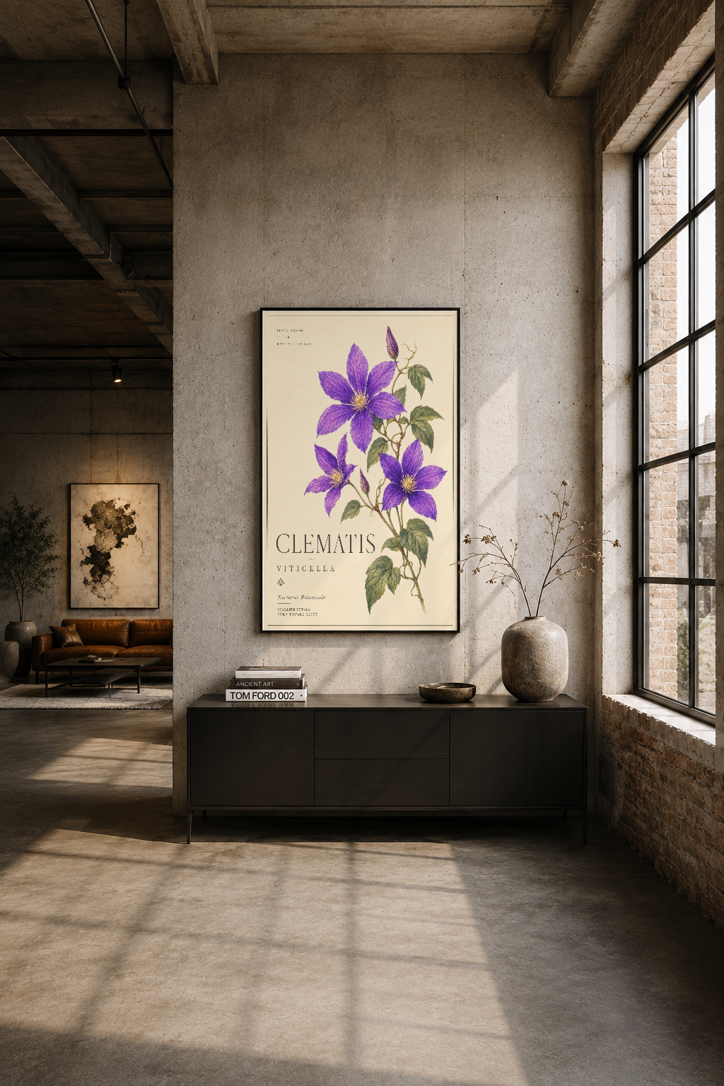 Modern endüstriyel oturma alanında siyah çerçeveli Clematis Viticella tablosu.