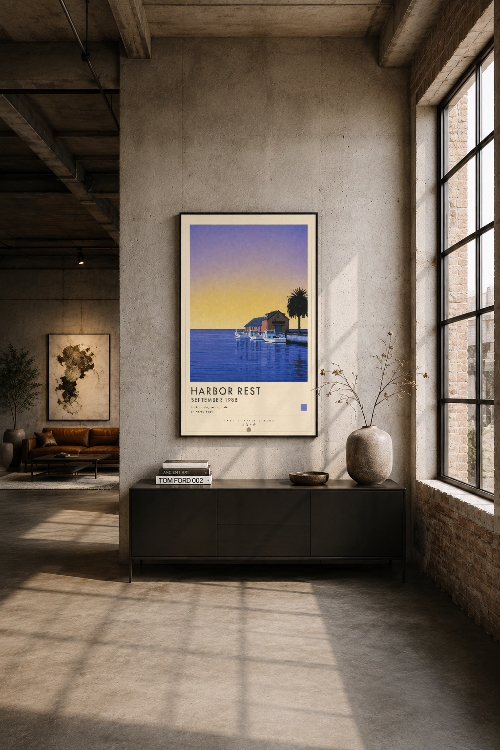 Industrial tarzı odada siyah mobilyenin üstüne asılı Harbor Rest posteri, geniş pencerelerle aydınlanan.