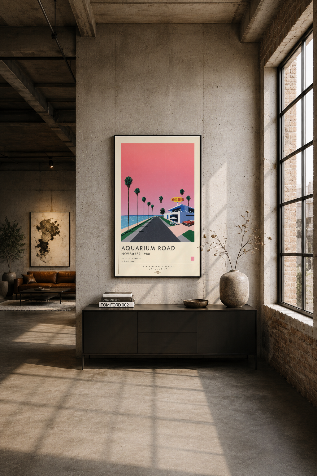Siyah çerçeveli Aquarium Road tablosu, endüstriyel betonun yanında modern loft stilinde sergilenen sanat eseri.