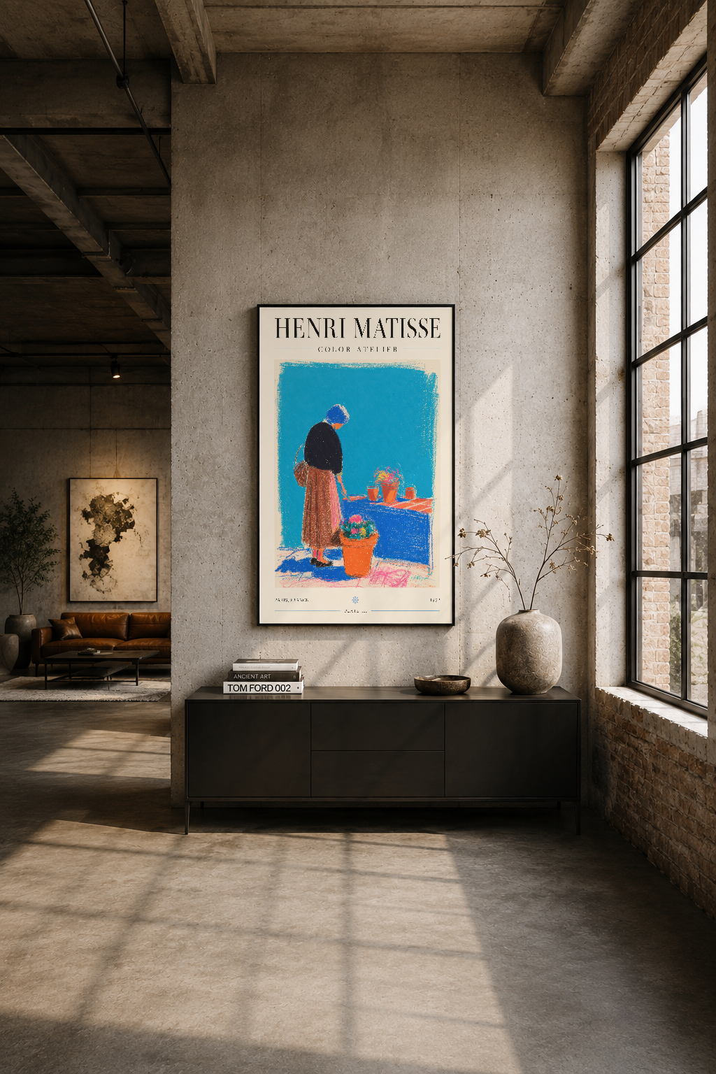 Industrial loft'ta Matisse tablosu siyah çerçevede, beton duvar ve geniş pencerelerle çarpıcı kontrast oluşturuyor.