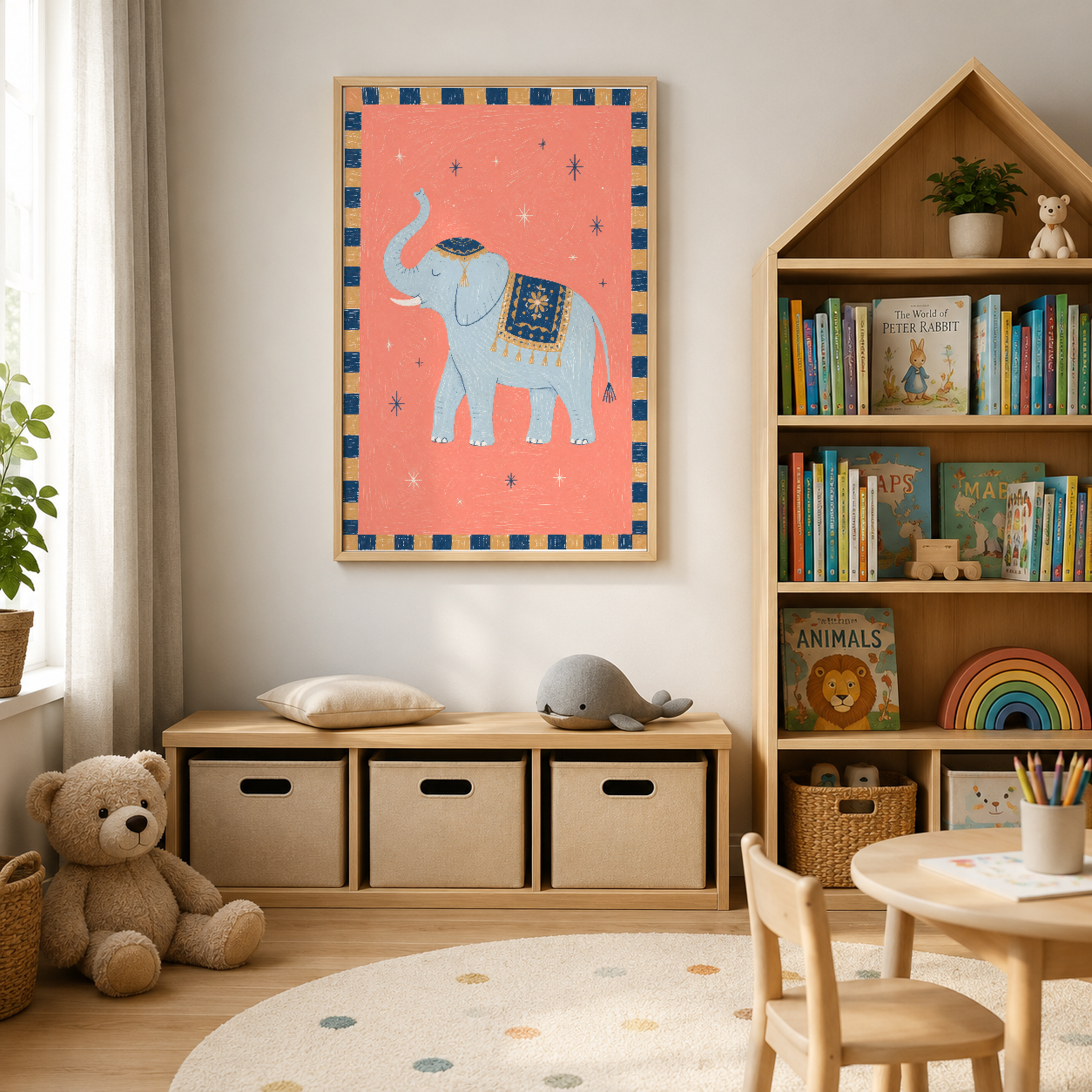 Çocuk kütüphanesinin yanında asılı, boho stil fil desenli turuncu tablo.