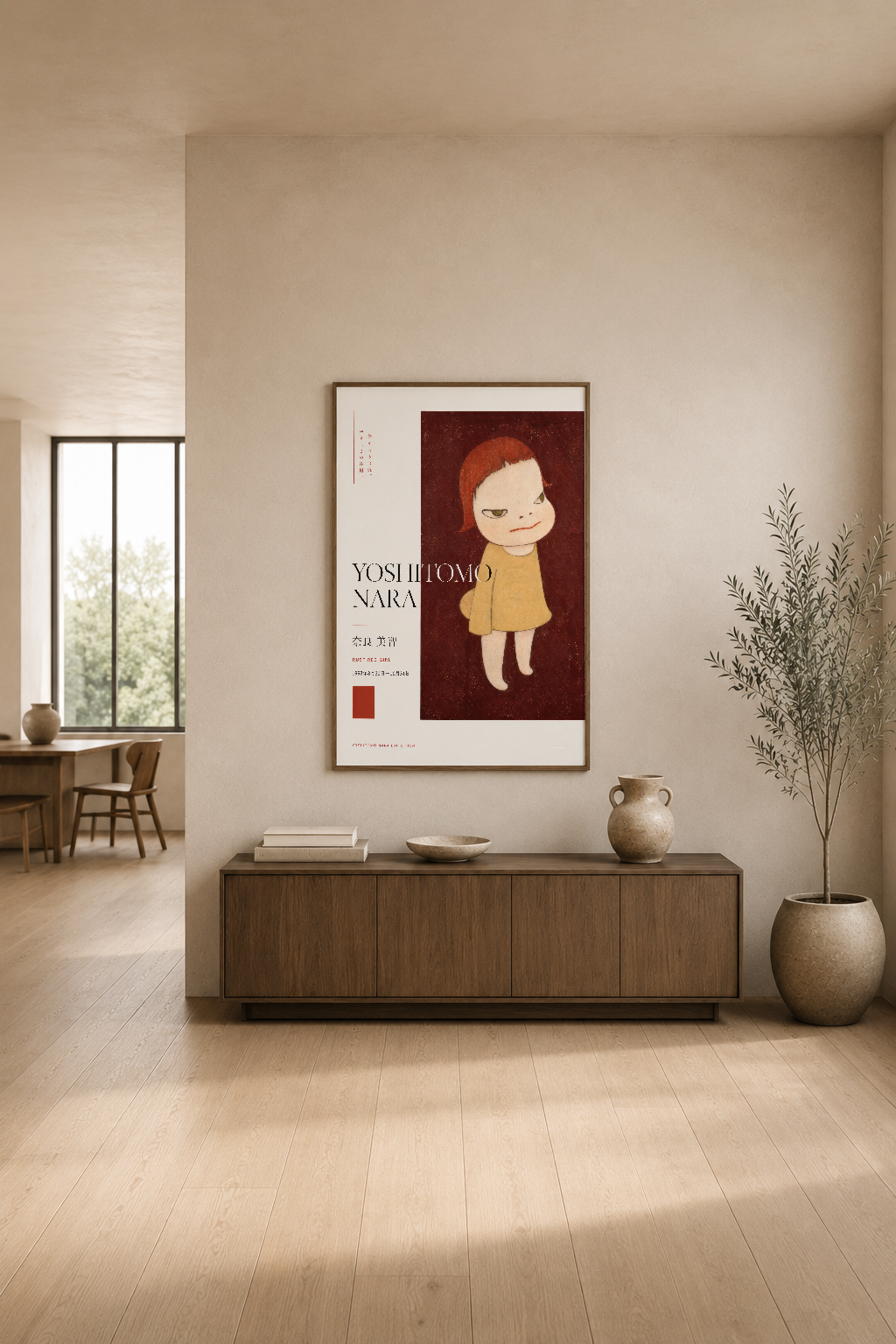 Yoshitomo Nara imzalı sanat posterinin, modern oturma odasında konsolun üstünde sergilenmesi.