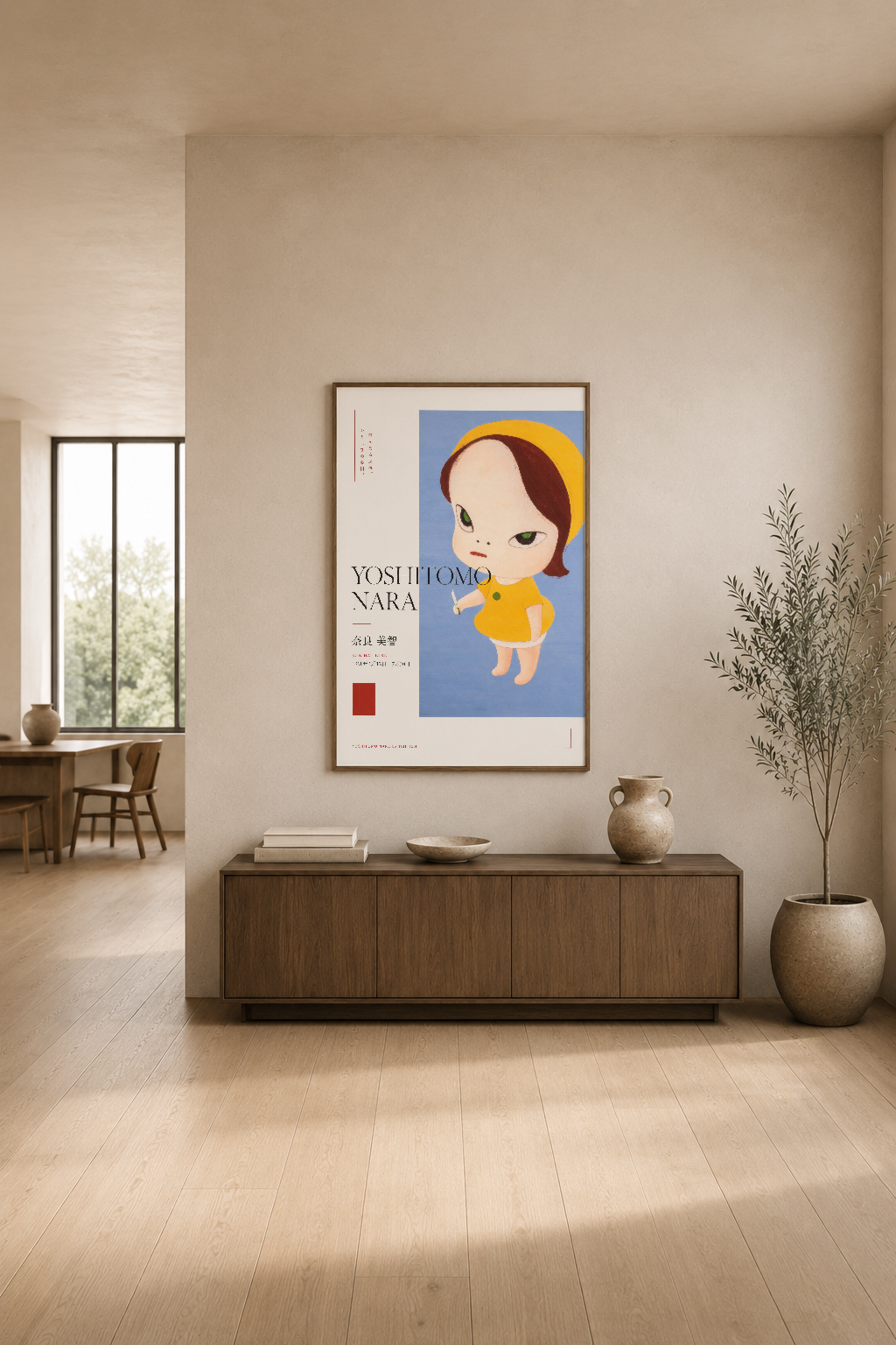 Yoshitomo Nara poster, modern oturma alanında mobilyanın üstünde, tipografik ve renkli illüstrasyonuyla dikkat çeken